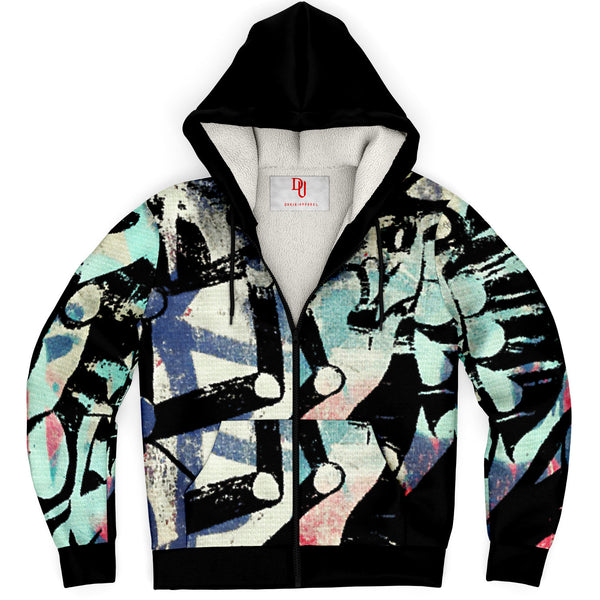 close up of a zip up microfleece hoodie with a multicolored  graffiti pattern