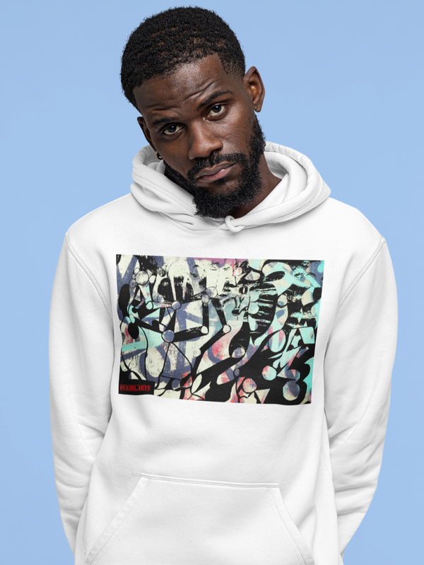 man in a white hoodie with abstract unique graphic prints with a streetwear style