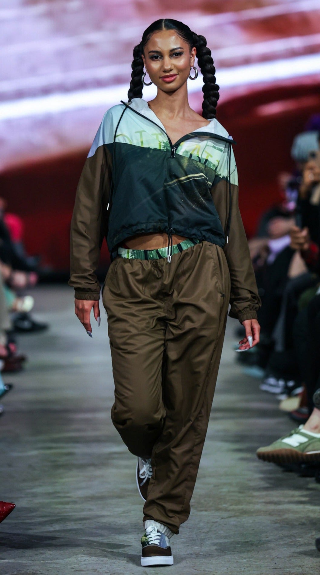 woman wearing journey 1 allover print tracksuit for a streetwear urban aesthetic.