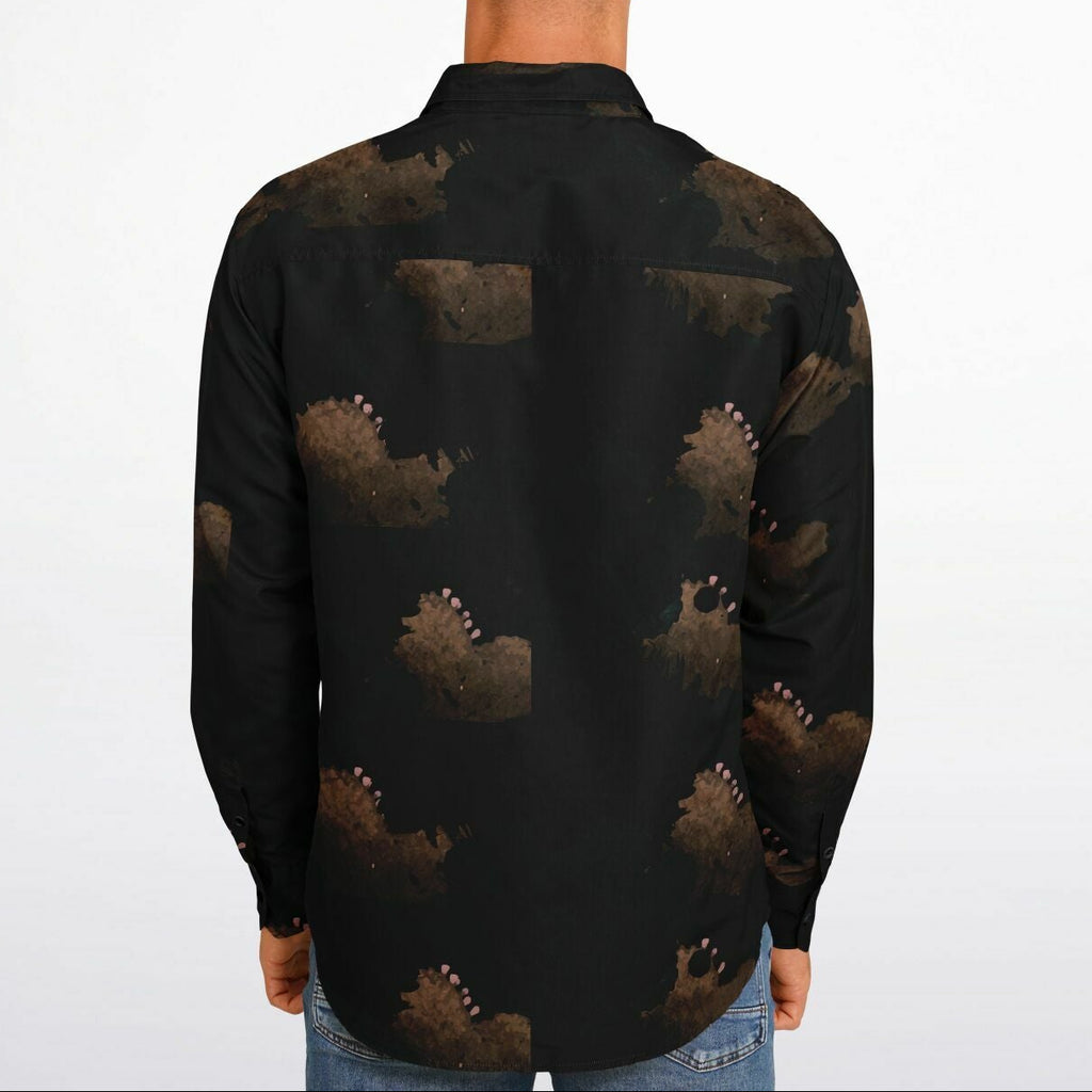Man wearing a black patterned shirt on a white background