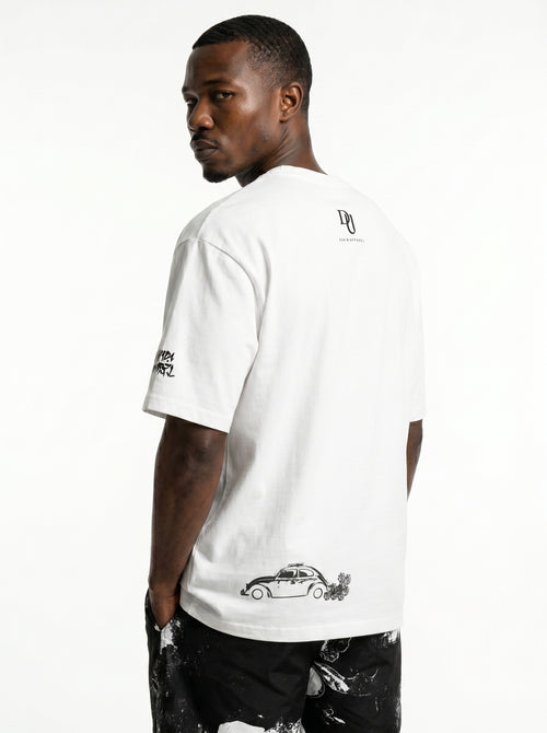 Man wearing a white t-shirt with black graphics on a white background