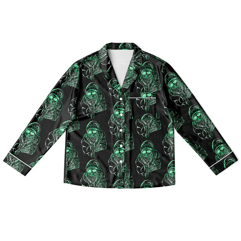 Black shirt with green alien pattern on a white background