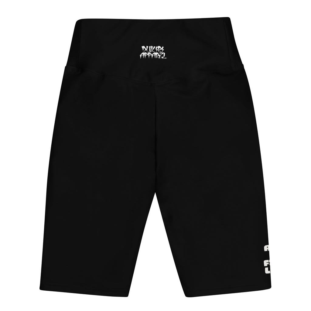 Black shorts with a logo on the waistband against a white background
