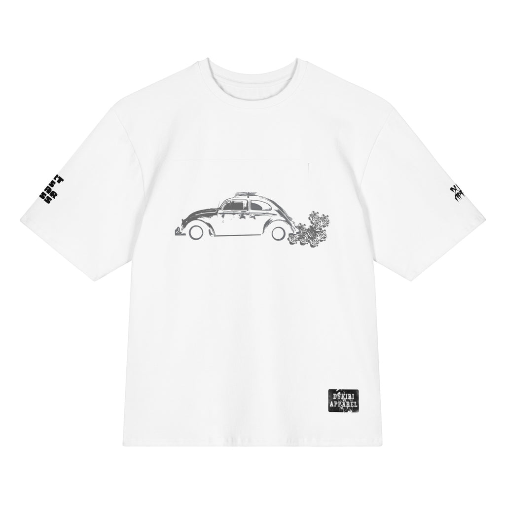 White t-shirt with black car and flower graphic on a white background