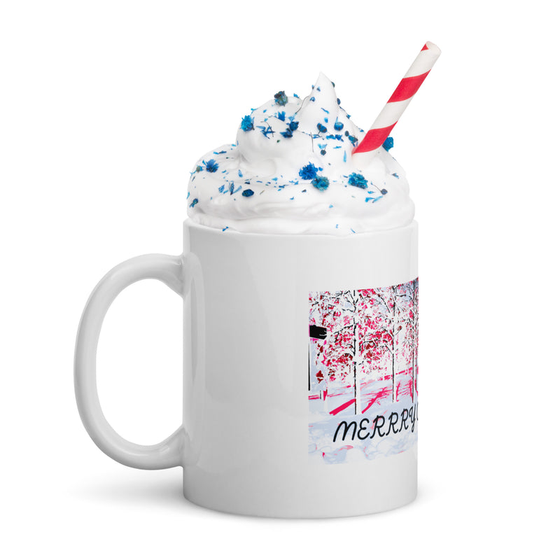 White mug with whipped cream, blue sprinkles, and a red and white striped straw on a white background.