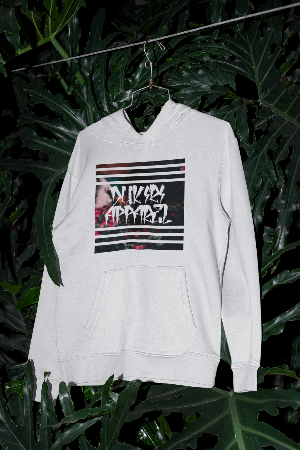 Cubism white streetwear hoodie surrounded by leaves