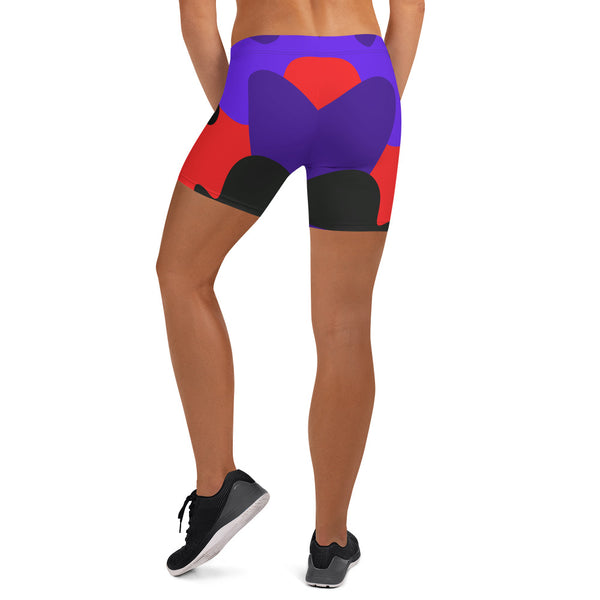 a woman in a short shorts with a heart on it